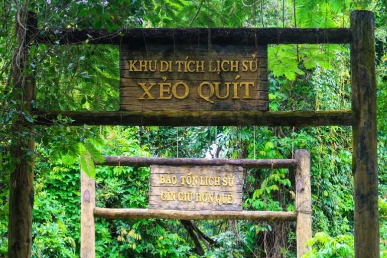 A sign in the woods
AI-generated content may be incorrect.